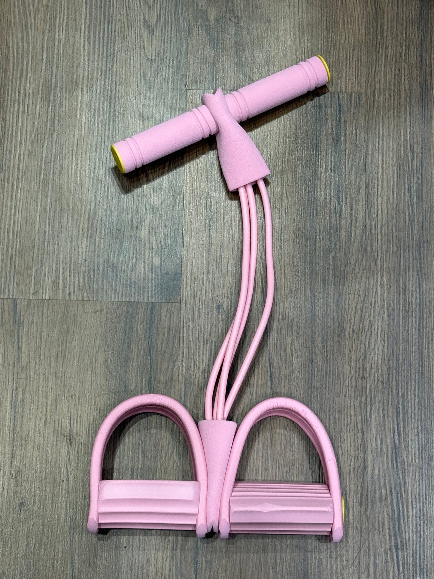 Tummy trimmer with pedals